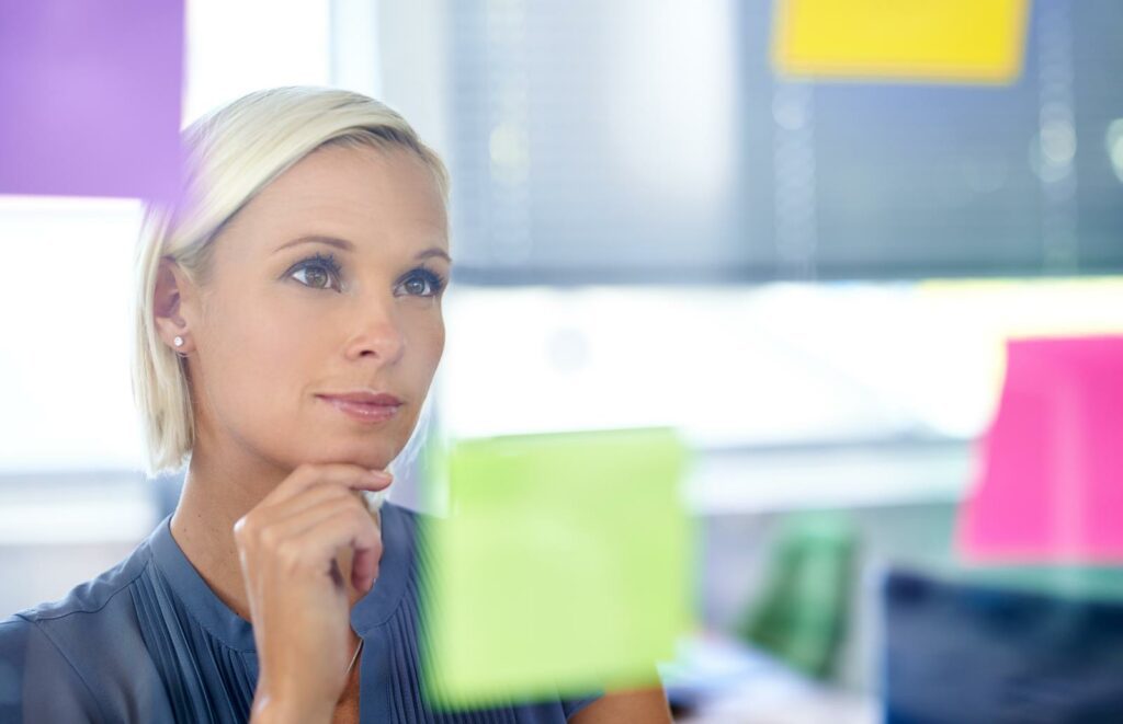 A Woman Thinking Before Deciding Between Consulting Offers